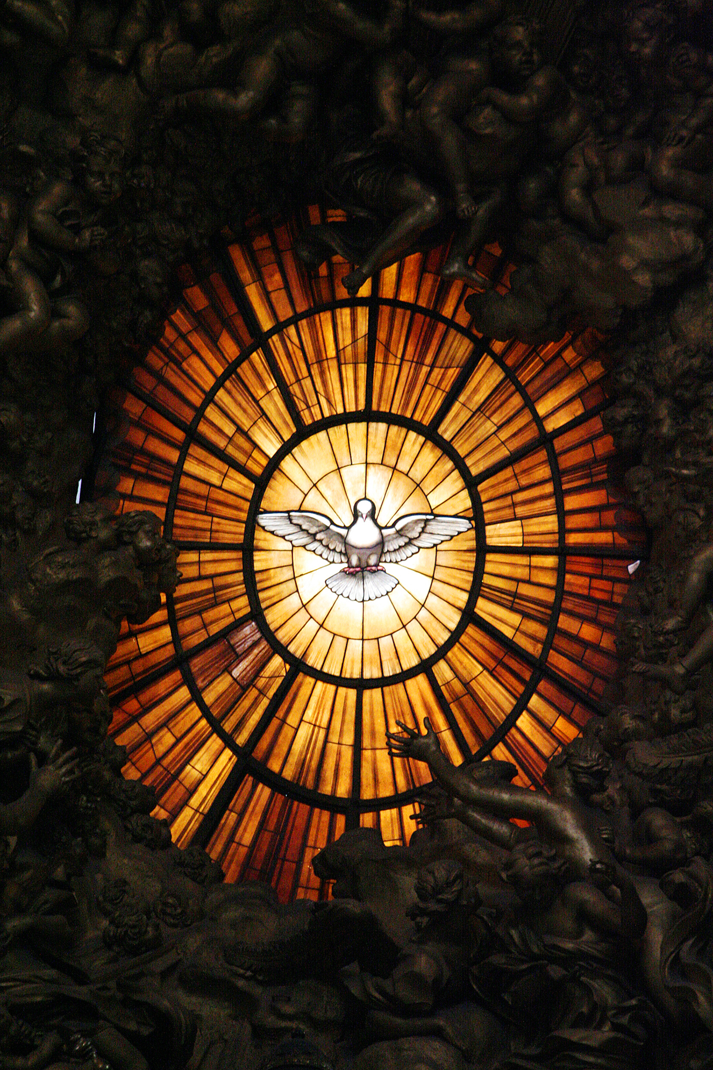 Stained glass window depicting the Holy Spirit. St. Peter's and Paul Basilica, Rome.
