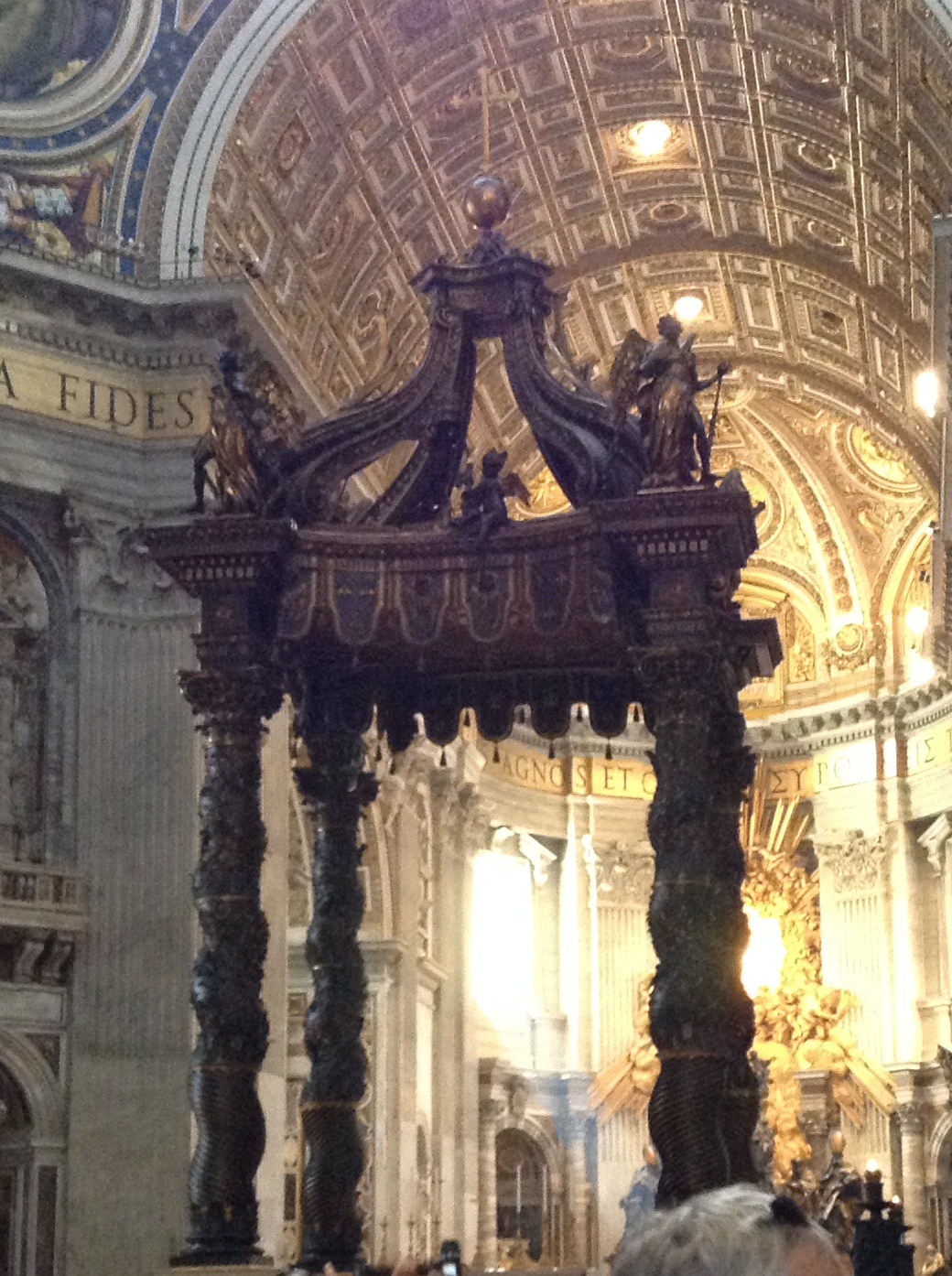 Bernini's famous baldacchino inside of St. Peter's Basilica, Rome.
